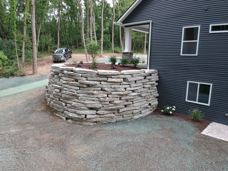 Ledge rock retaining wall project in Brighton MI